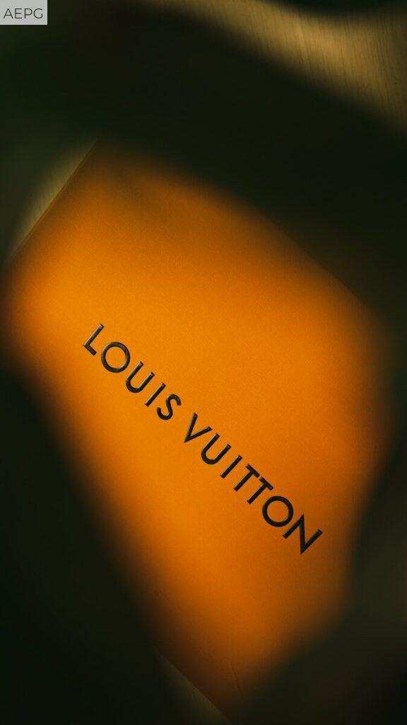 a close up of a book with the word louis vutton on it